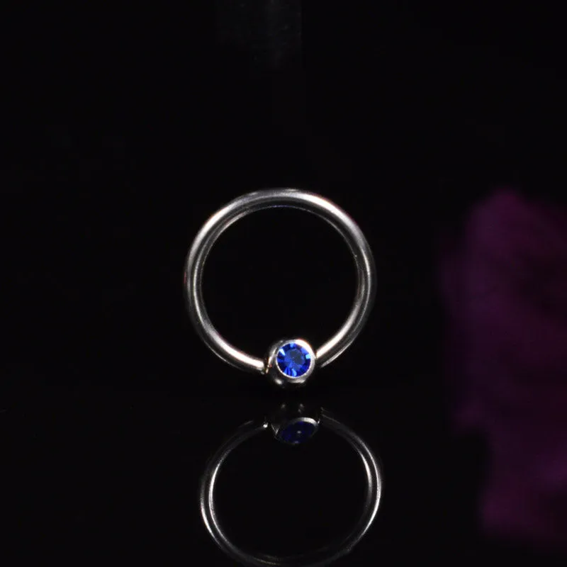 BCR Ring with Blue Gem