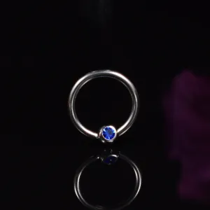 BCR Ring with Blue Gem